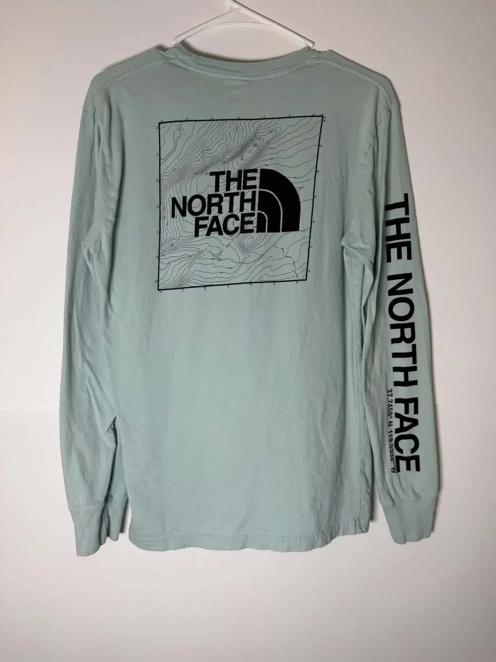 The North Face Long Sleeve Top with Topographic Map Design and Arm Logo